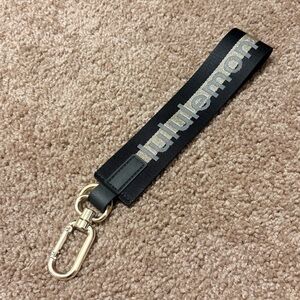 Lululemon Black Gold Never Lost Keychain